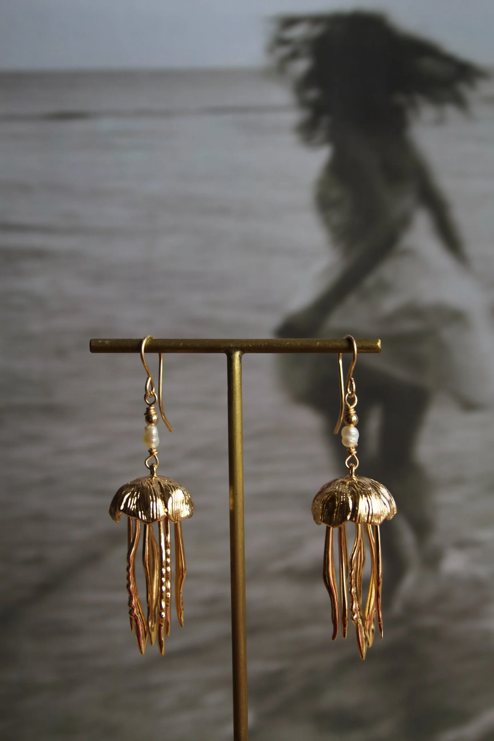 14ct gold filled earrings with fresh water rice pearls, gold filled bead and 18ct gold plated Jellyfish charms.