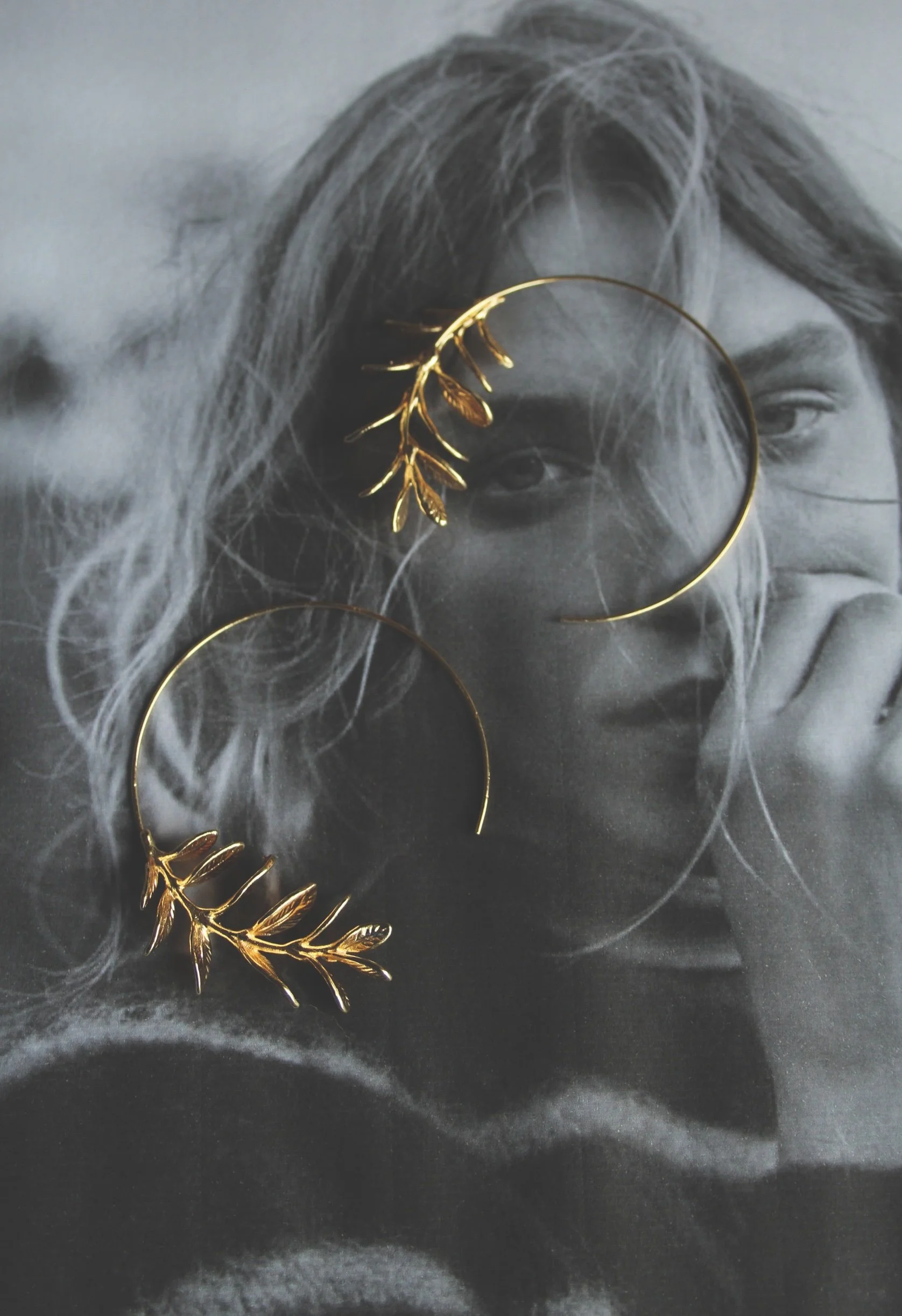 18ct gold plated leaf hoops.