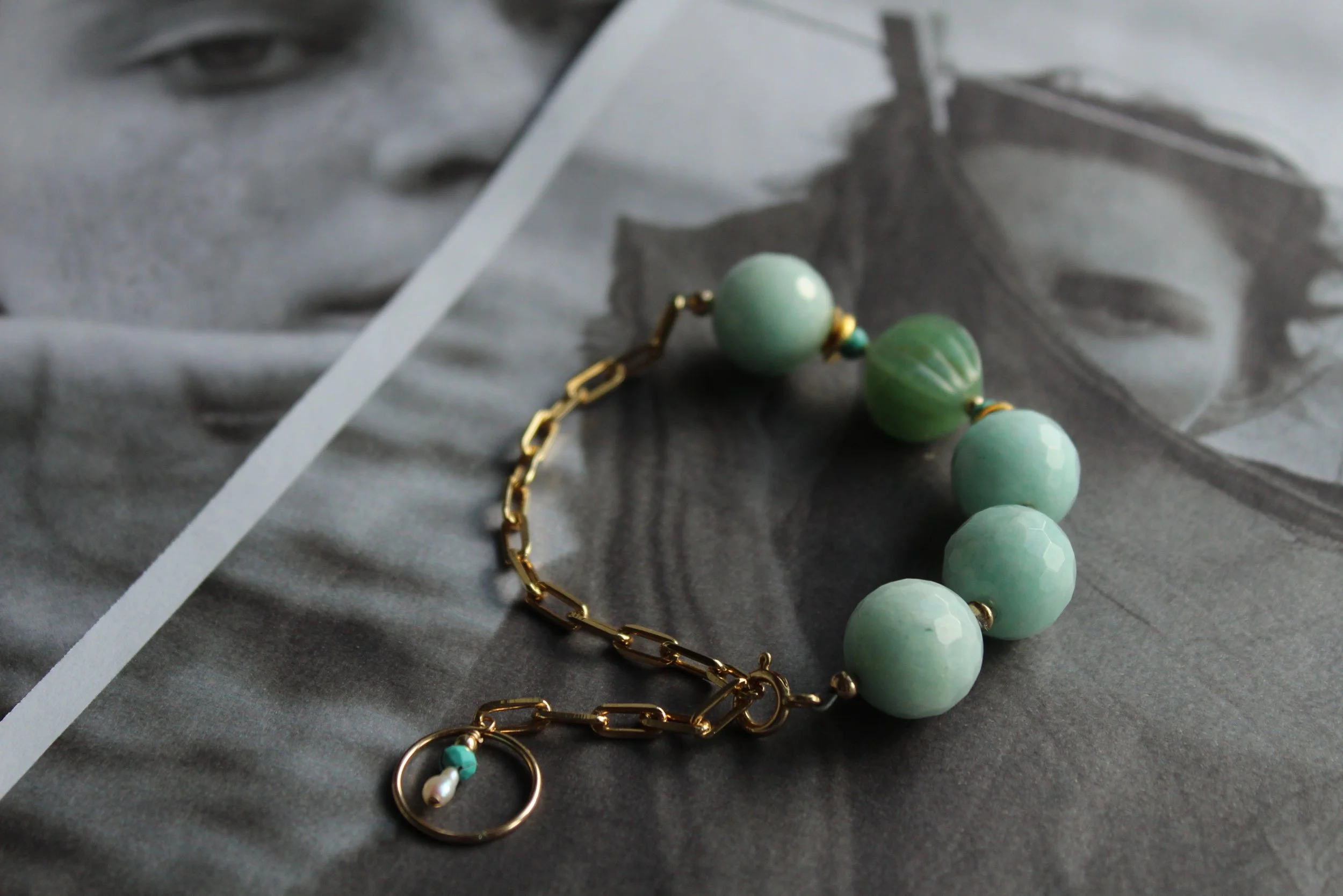 14ct gold filled paper chain bracelet with faceted round amazonite, gold filled beads, turquoise roundels and carved green aventurine.