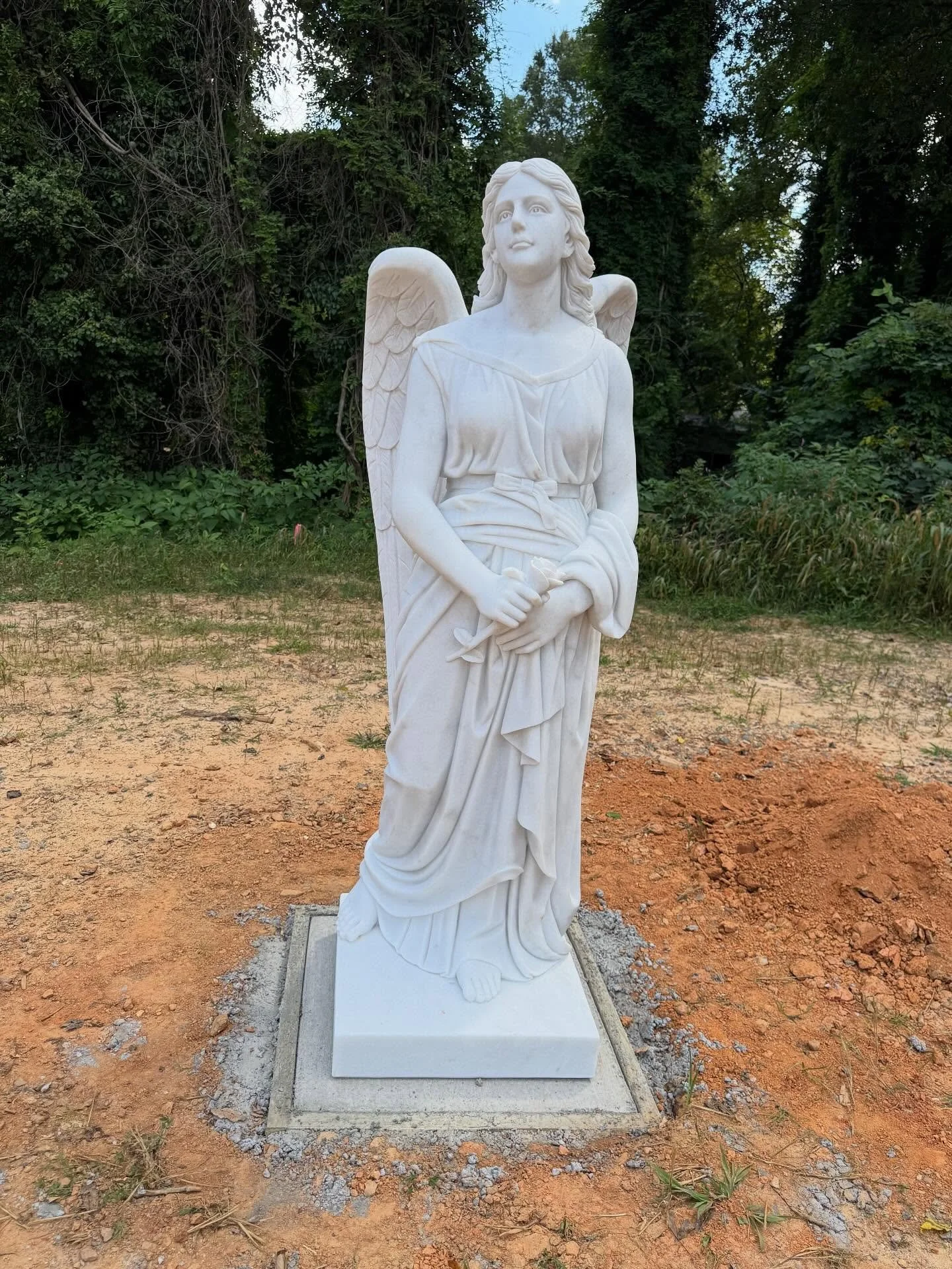 We are excited to reveal the installation of the Holy Guardian Angel anchoring the expansion of the SSJOA cemetery.