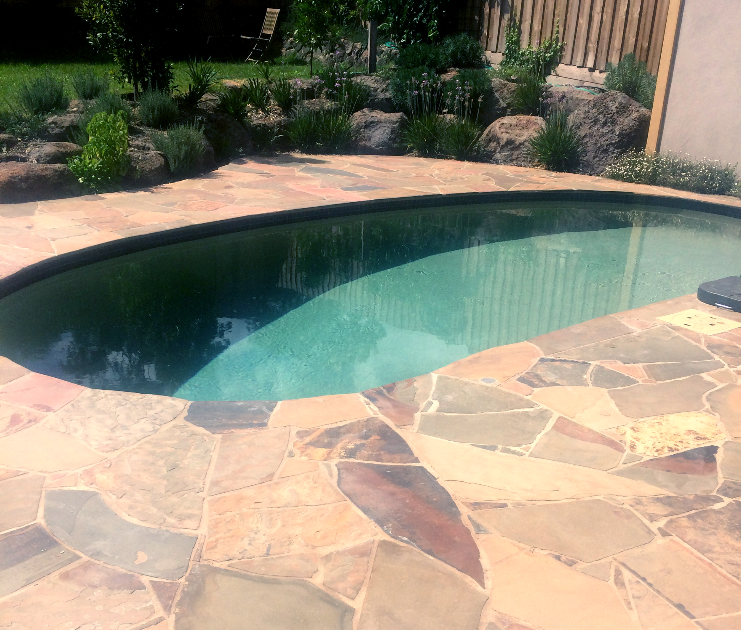  Crazy Paving in Kruger Slate around Pool as Coping 