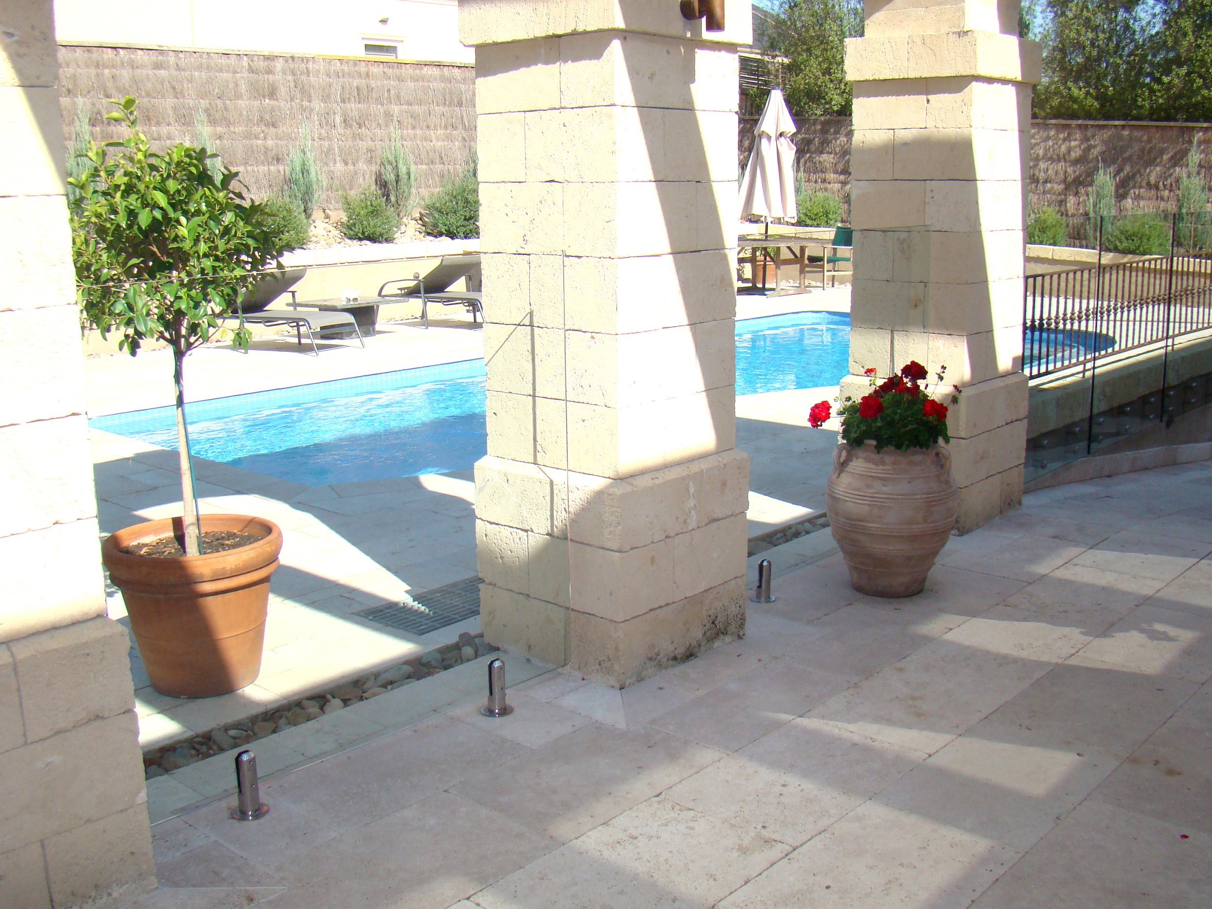 Classic Unfilled Travertine on Patio and Pool Area
