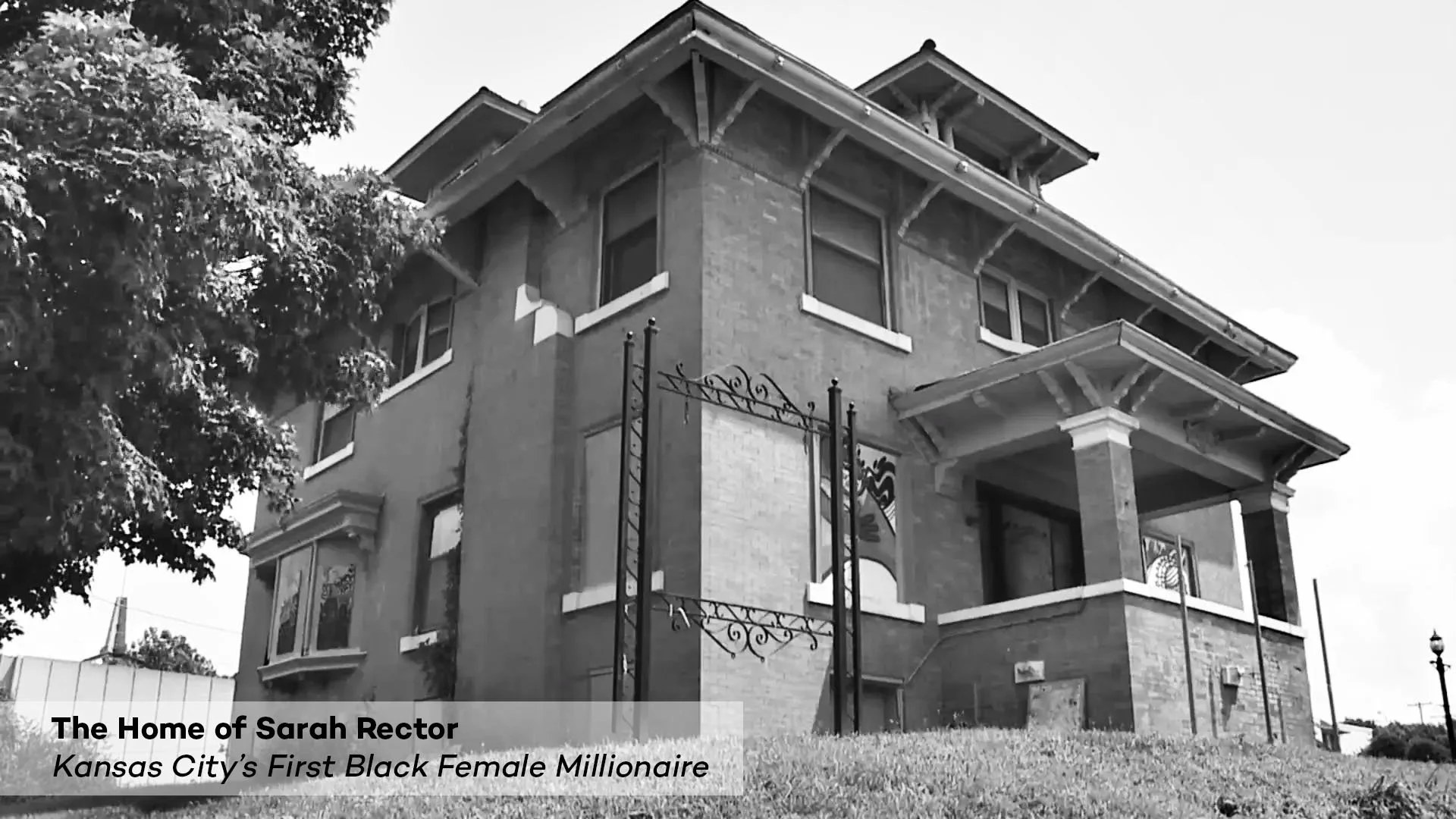 Historic brick home of Sarah Rector, Kansas City’s first Black female millionaire, photographed in black and white.