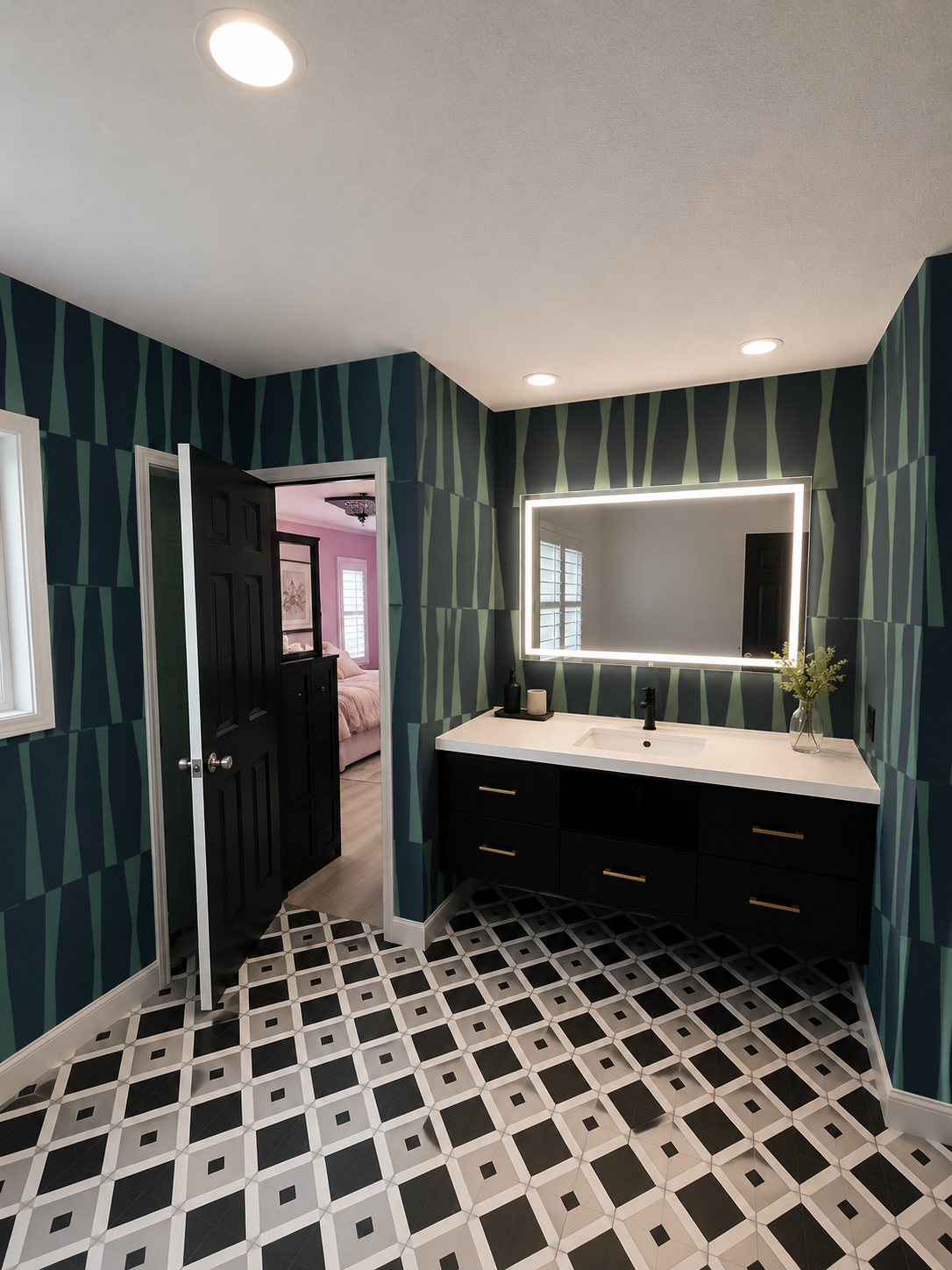 Modern bathroom featuring bold green geometric wallpaper, a black floating vanity, illuminated mirror, patterned tile flooring, and black trim.
