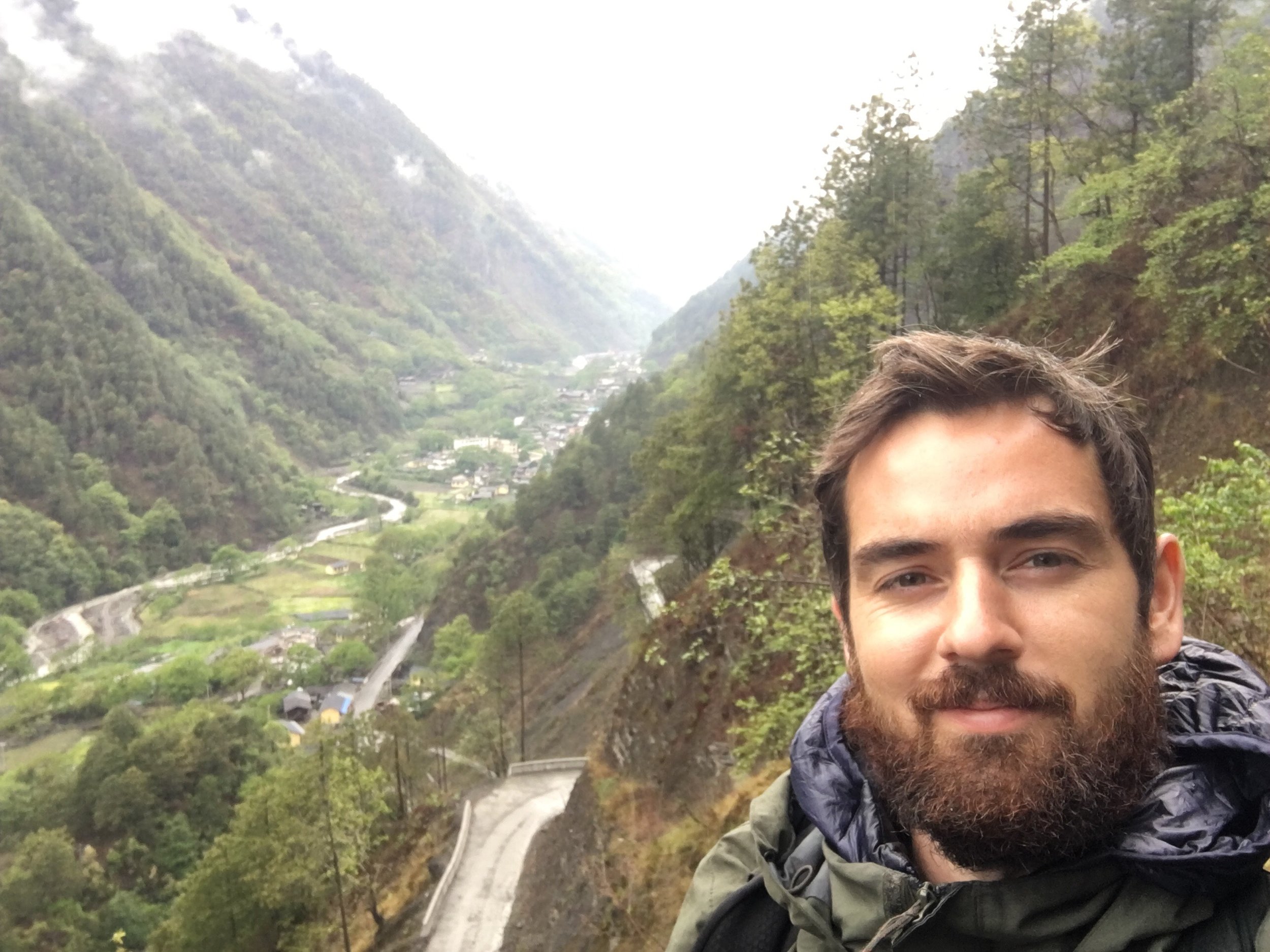 Overlooking the village on a grim, drizzly day. Spirits still high. 