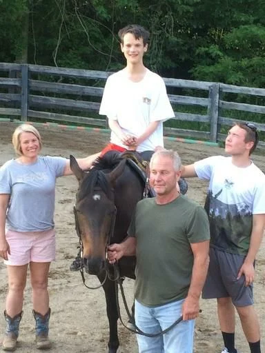 Sold ... Blitz 5 Yr Old QH in his new home with the England Family (owners of Dimples Horse Treats) here he is settled in and lending a ride to their special needs son.