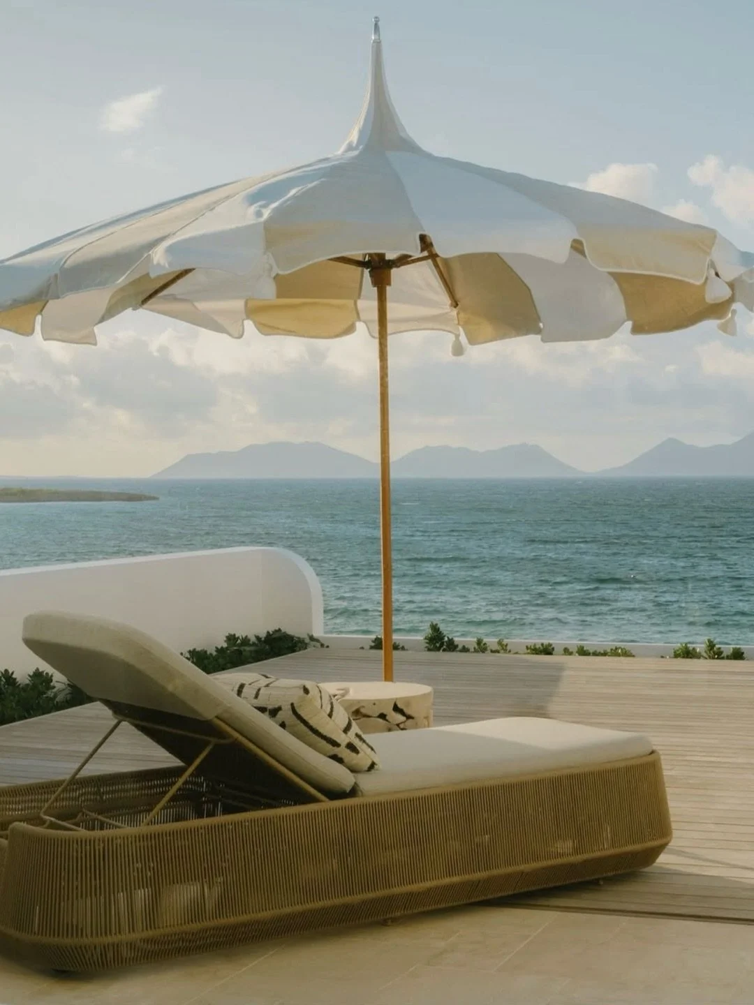 Whitewashed villas with Greco-Moorish arches open directly onto the sand, while interiors balance barefoot ease with refined detailing. Dine by the water&rsquo;s edge, join rum tastings, or unwind at the spa where botanicals echo the island&rsquo;s n