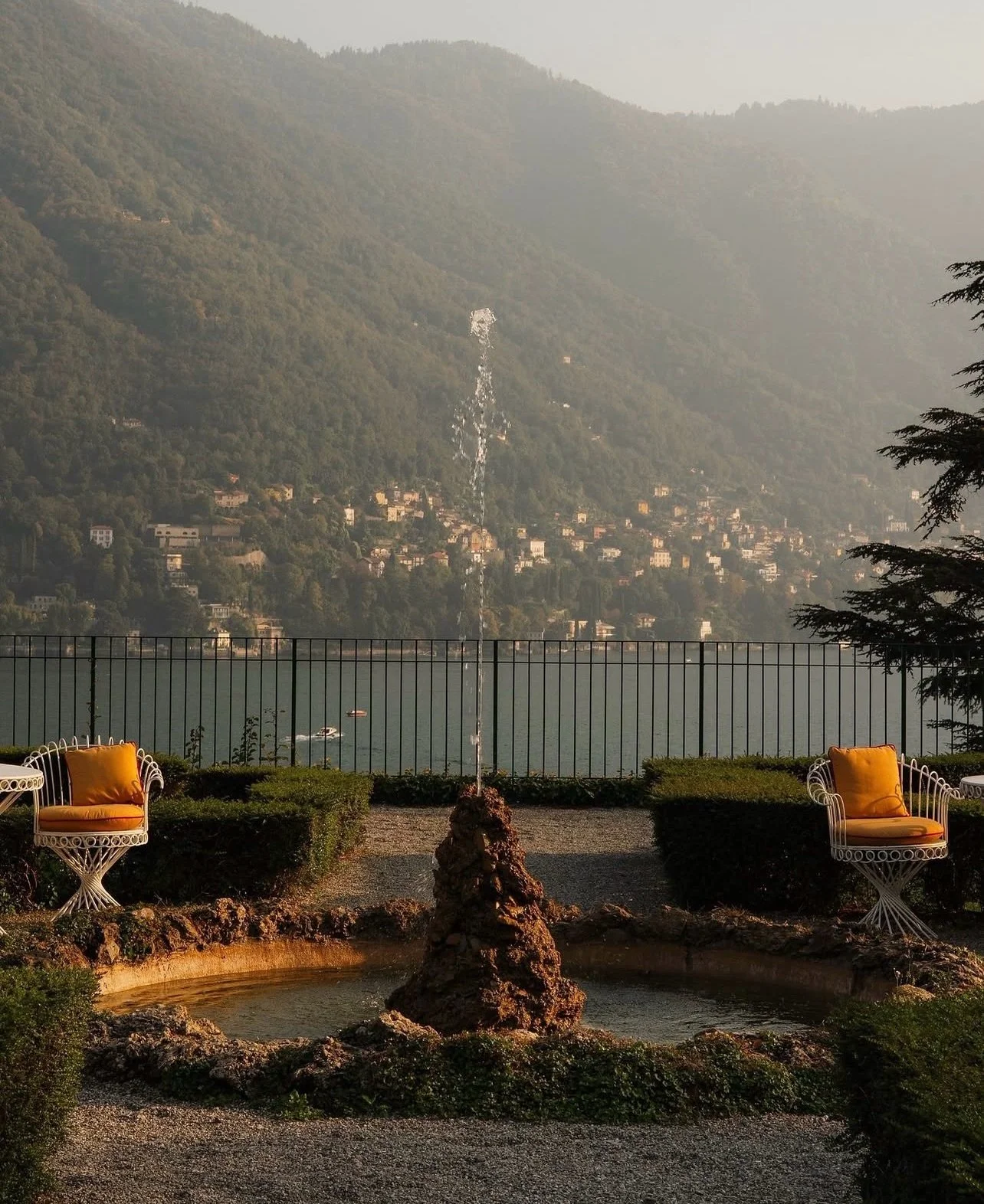 Lake Como in early autumn loses none of its drama and gains a great deal of calm. The steep, wooded mountain sides flanking the water are at their most striking under softer late-summer light, and the lake itself &mdash; best experienced from the dec