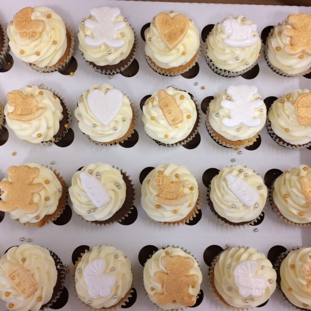 white and gold baby shower cupcakes