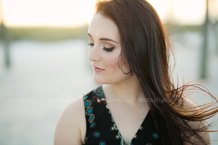 Gorgeous photo of high school senior on the beach in Tampa florida with Theresa Marie