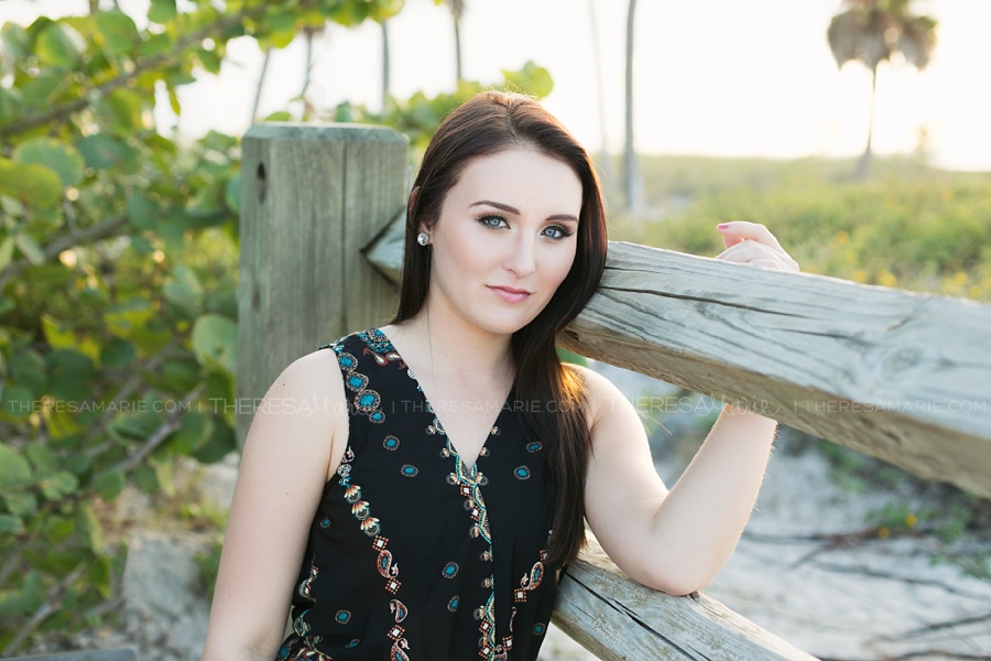 casual on location beach senior pics in Tampa near the water