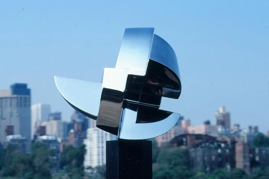 Crystal 2, is 40 inches high and is polished stainless steel