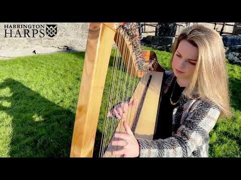 Aisling Lyons playing her Harrington Harp in the beautiful ruins of Clare Abbey, Co Clare. The tune is Deoraíocht Colmcille, written by Michael Rooney