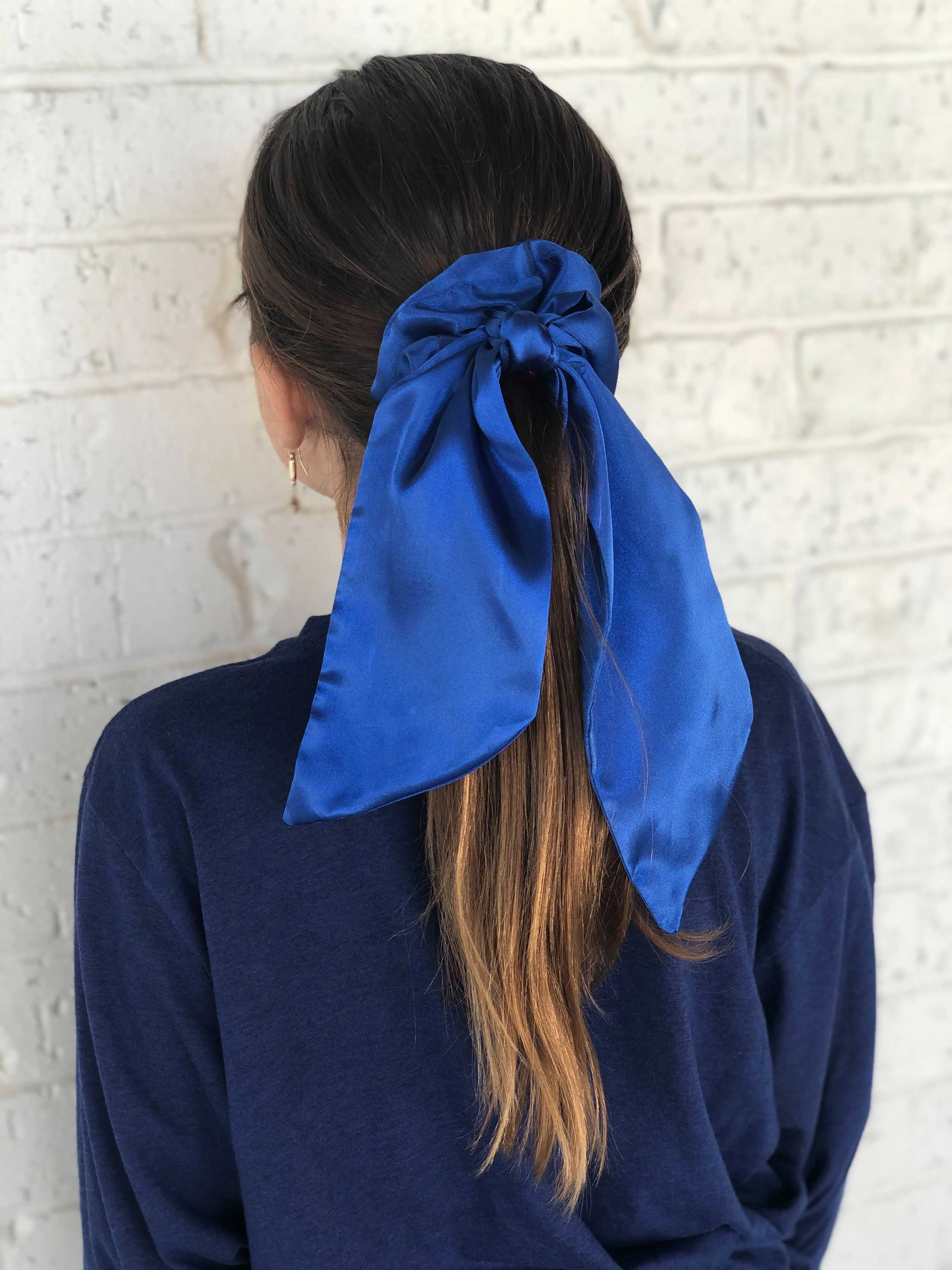 NHM Scrunchie with Tails Blue on a kiddo.jpg