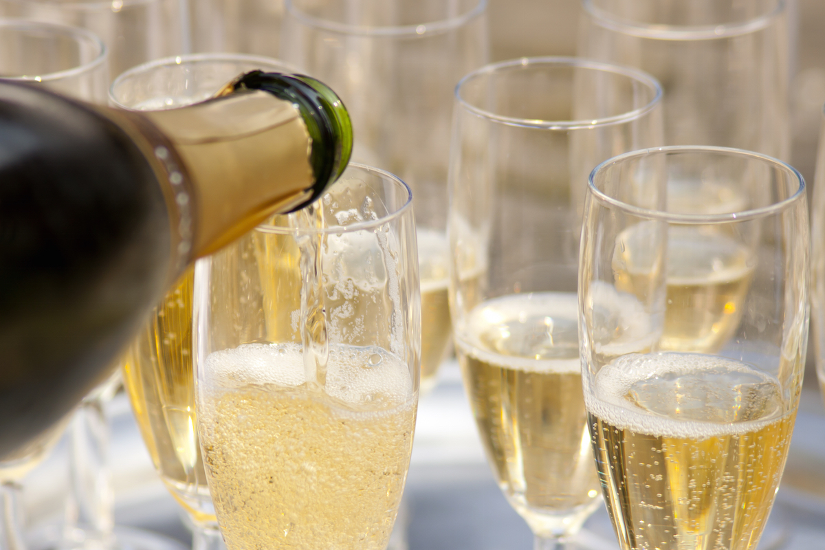 shutterstock_Champaign-being-pored-into-glasses.jpg