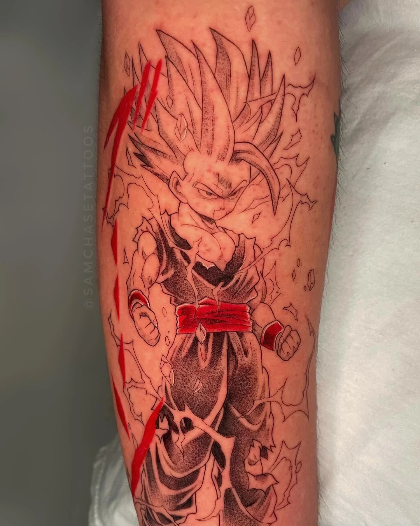Black and red Gohan 🖤⚡️❤️ Enjoyed recreating this panel, it&rsquo;s nicely situated on the opposite arm of a Evangelion piece we did over a year ago!
.
.
.
#dragonballztattoo #gohantattoo #mangatattoo #animetattoo #femaletattooartist