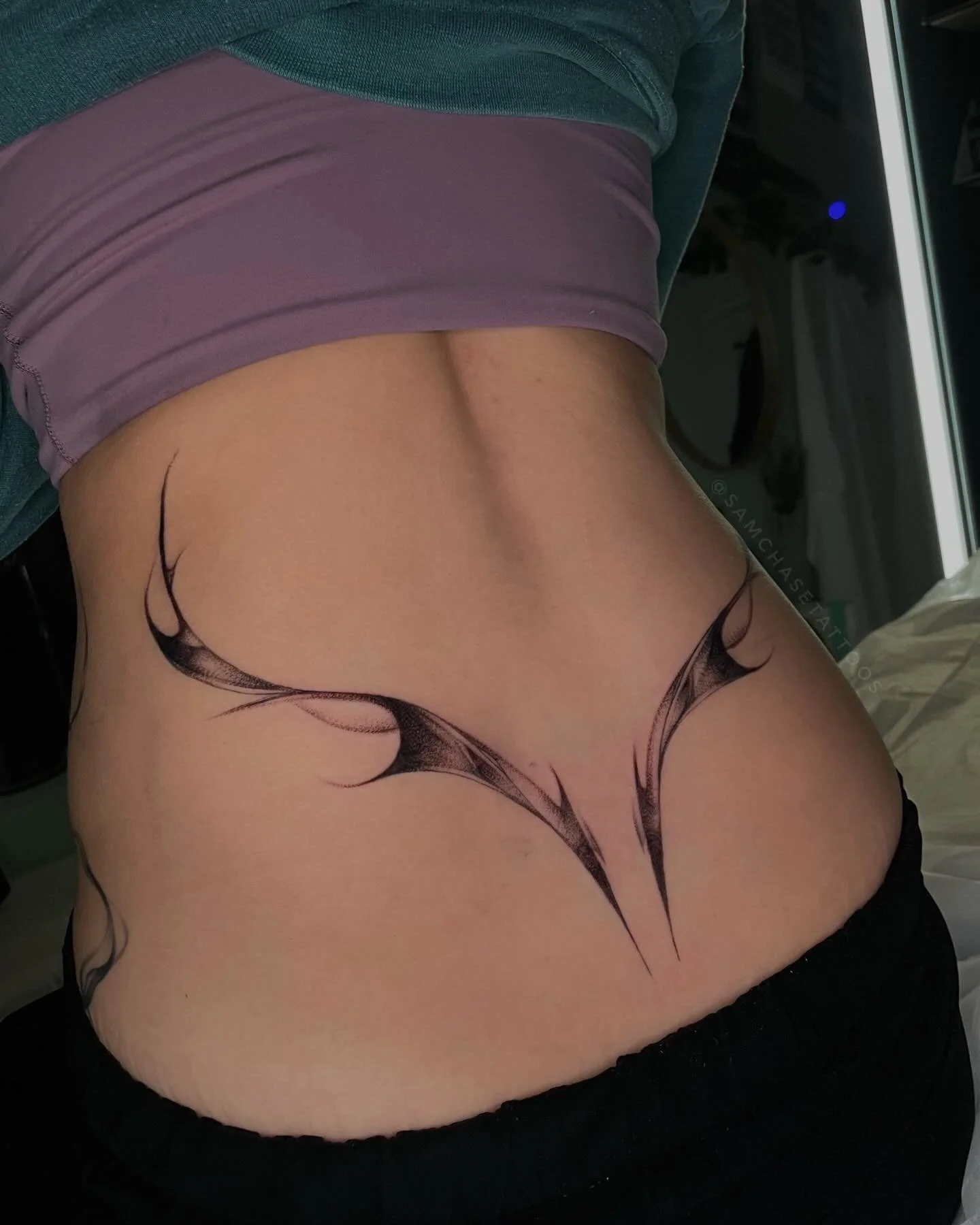 Lower back goodness 🖤 This piece is actually a slight update/rework of a piece we did about a month or 2 ago! The client wanted to move in a different aesthetic direction and we were able to expand and change the form a bit- I&rsquo;m even happier w