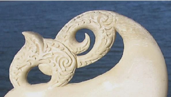 This manaia face needs no physical resemblance to the toroa or albatross because it portrays the spirit of these magnificent birds. The birds replacing the chips to restore the tree in the carving of the Rata legend (page 42) were also represented i…