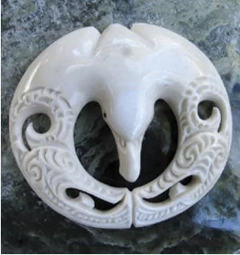 The wings here are depicted as manaia faces to acknowledge their gift of flight and their supreme ability to harness extreme elements and keep toroa safe, unruffled and serenely elegant