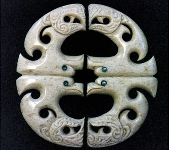 Kahu circling overhead, carved from sperm whale jawbon