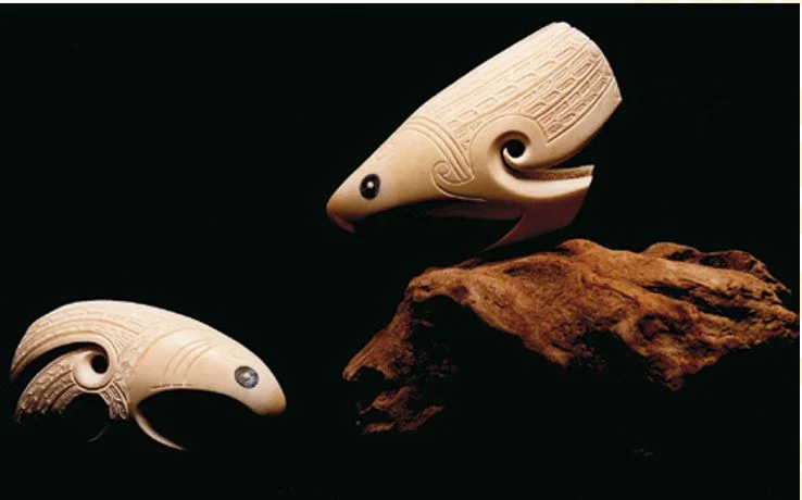 For this carving I stylised a pair of eagles from two whale teeth and posed them standing, gazing down from their mountain-peak nest