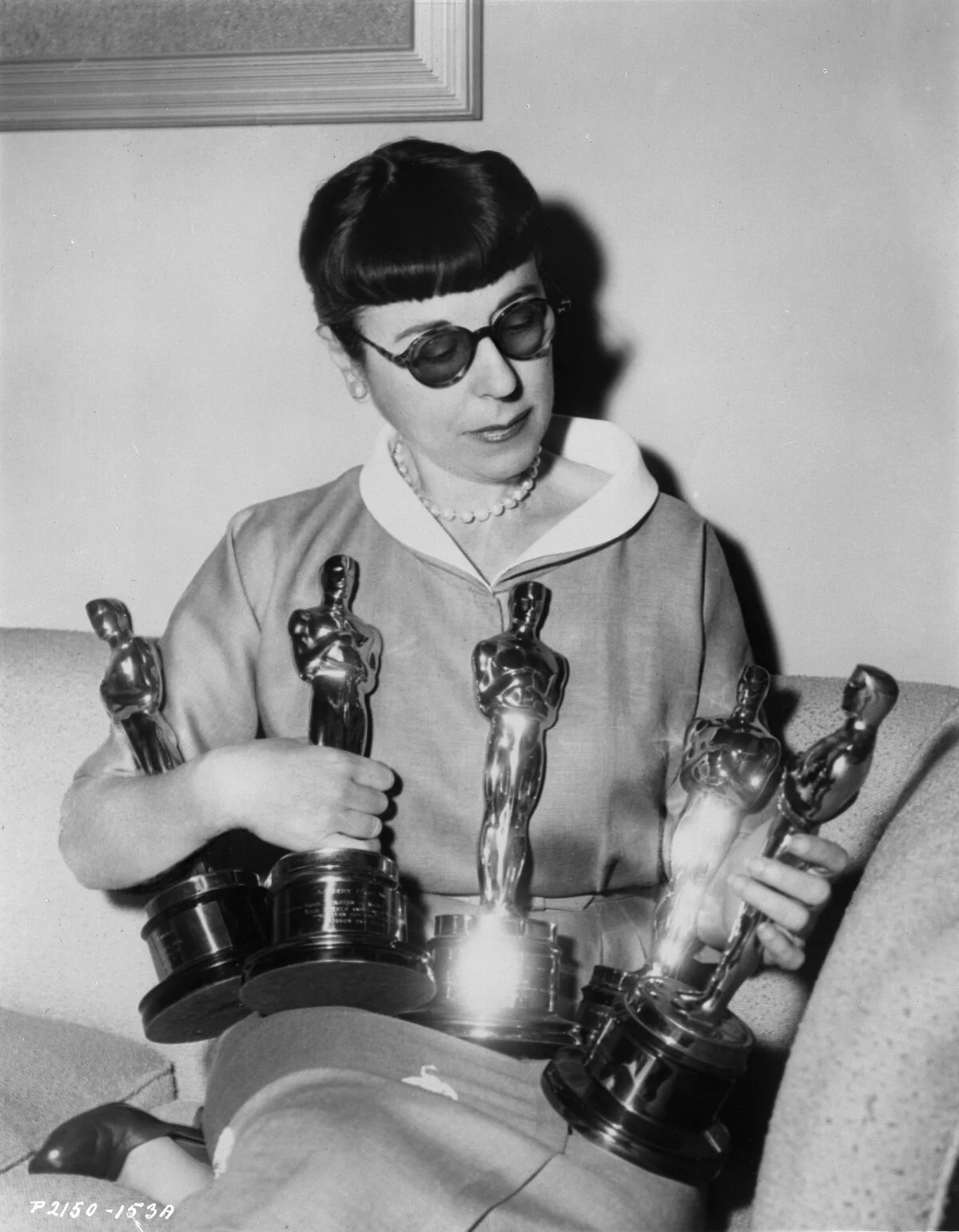 Edith Head with five Academy Awards