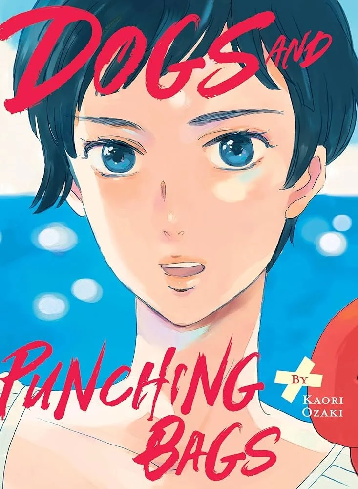 "Dogs and Punching Bags" by Kaori Ozaki. A young woman with short dark hair and large blue eyes against a bright, sunny ocean background. The title is written in bold red, stylized text.