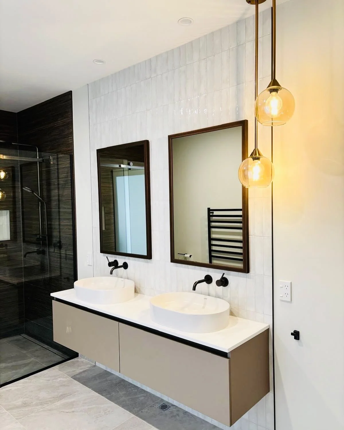 Ensuite Refurbishment // Sandstone marble with gunmetal tap ware and free standing bath. Feature wall tiles in a linear format. Colour palette sand and chocolate accents. 

For any interior design or colour consults click link in bio!

#allureicc #in