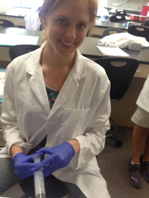 Throwback: Katherine practicing IV pushes during class as part of her naturopathic education at Bastyr University.
