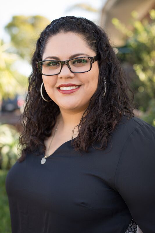 Speaking about what she finds rewarding about her work as a paralegal for a personal injury law firm, Yolanda says, "We deal with people who are injured at no fault of their own. Knowing that I can help, even if all I do is lend an ear, that gives me satisfaction." Photo by Marcy Browe Photography