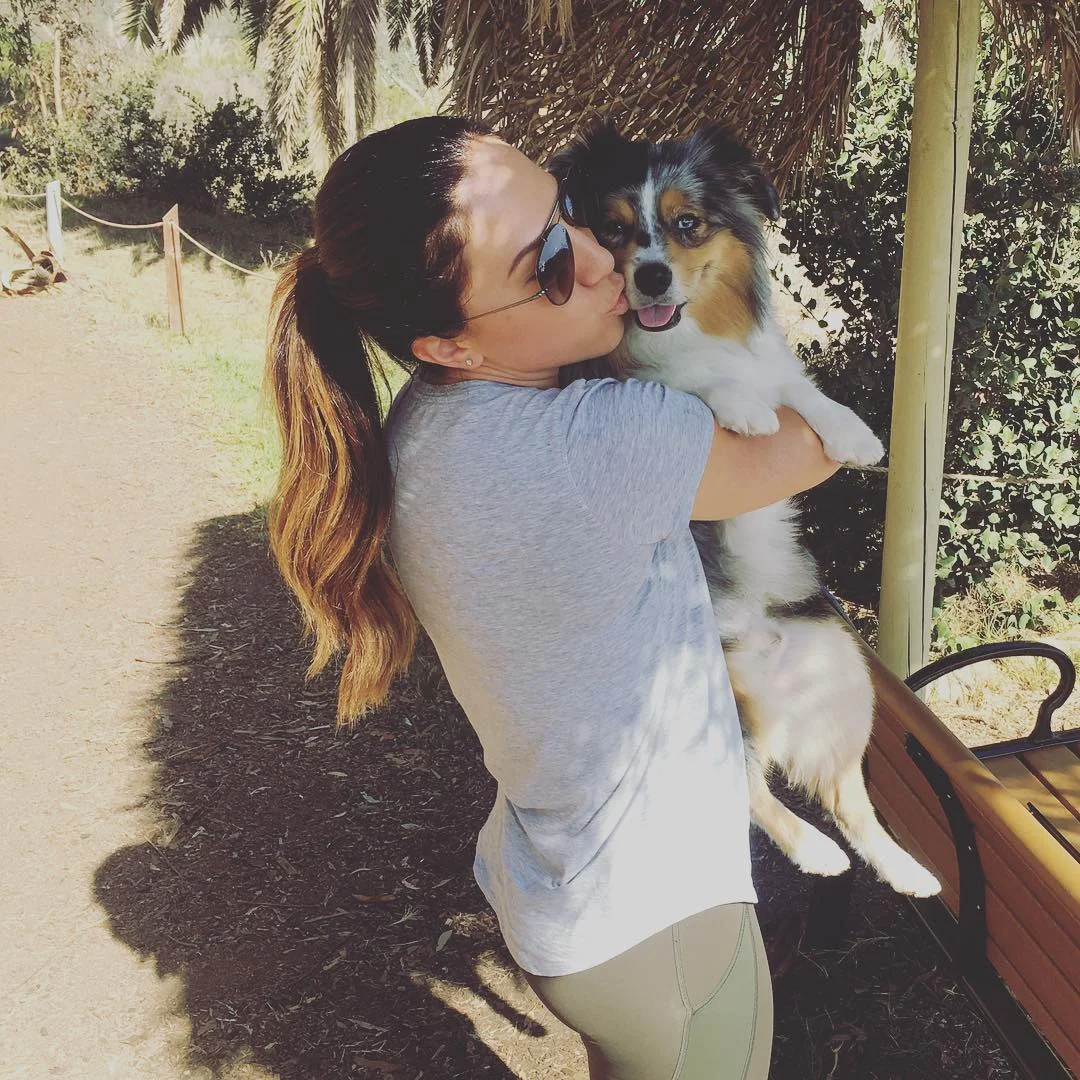 Dogs like Julianna's pup, Riley, make great exercise companions in that they often love spending time outdoors!
