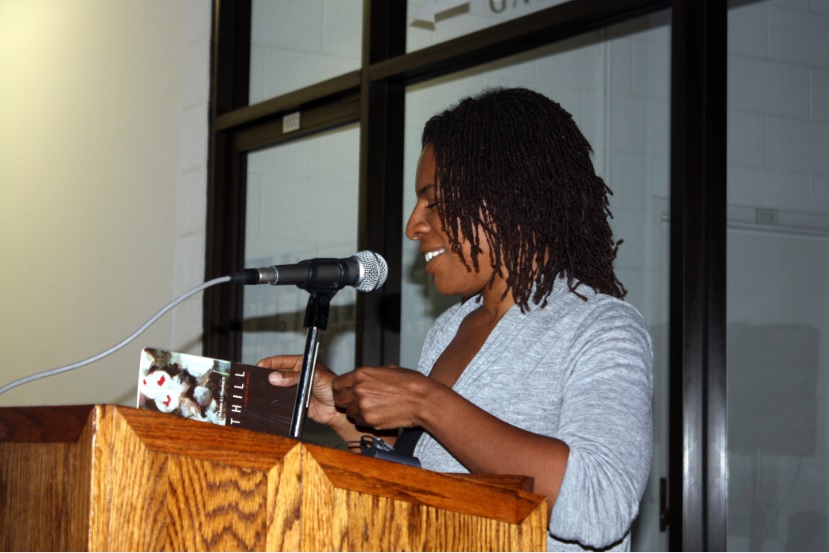 While Nikia is without doubt someone who has worked hard throughout her career, her view on success has more to do with attitude and less about accolades. She shares, "I have always noticed that the writers I looked up to were so easy and comfortable in their own skin. You think that the success got them there. But maybe it is the opposite way and that ease they had within their selves got them to success." Here she is pictured at a reading. 