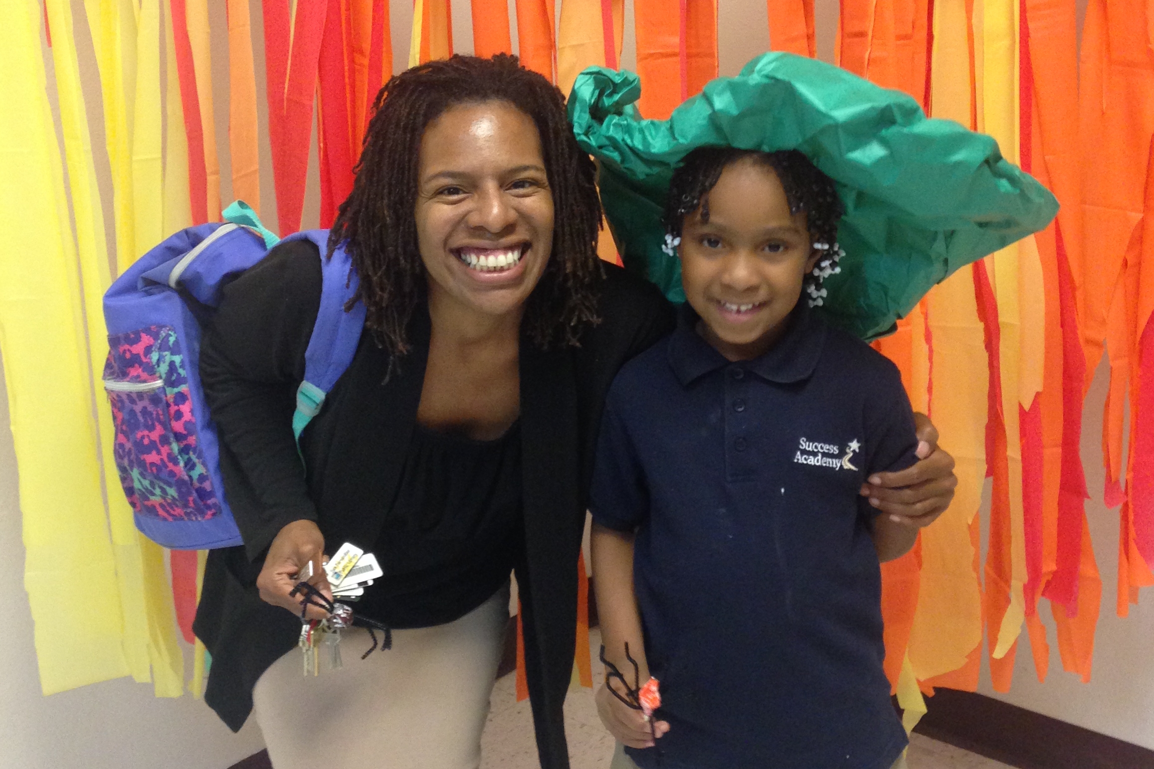 Of the many titles Nikia can claim, mom is definitely one that she carries with her at all times. In fact, she has also found ways to introduce her children and their classmates to the world of poetry and writing. Here she is pictured with her daughter at a fall program where Nikia taught the children at her daughter's school to write short poems. "My children are such an important part of my life," Nikia shares. "I try to volunteer time and do community events at their school programs as much as I can. That way I'm both being a mom and a writer/community organizer at the same time!"