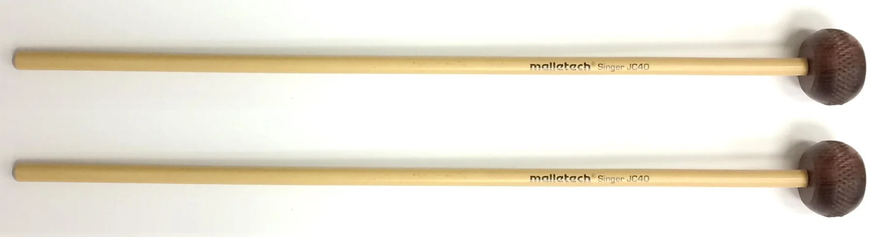 The Malletech Go2 Series presents the Jon Singer Rosewood Xylophone Mallet. Jon has used wooden mallets on his xylophone for many years and found that he liked the heads best after the fibers started to break down. Malletech has found a way to "pre-stress" the surface to get to that perfect, slightly softer attack right out of the bag. Unlike many "rosewood" mallets that are really other species of wood, these are made from marimba bars that didn't make the grade in Malletech's instrument department. 1-1/4-inch diameter certified Dalbergia Stevensoni Honduran Rosewood heads 7.5 to 8 mm diameter rattan Available from Steve Weiss Music at: https://www.steveweissmusic.com/product/malletech-go2-series-js40-jon-singer-custom-rosewood-xylophone-mallets/malletech-mallets#full-description