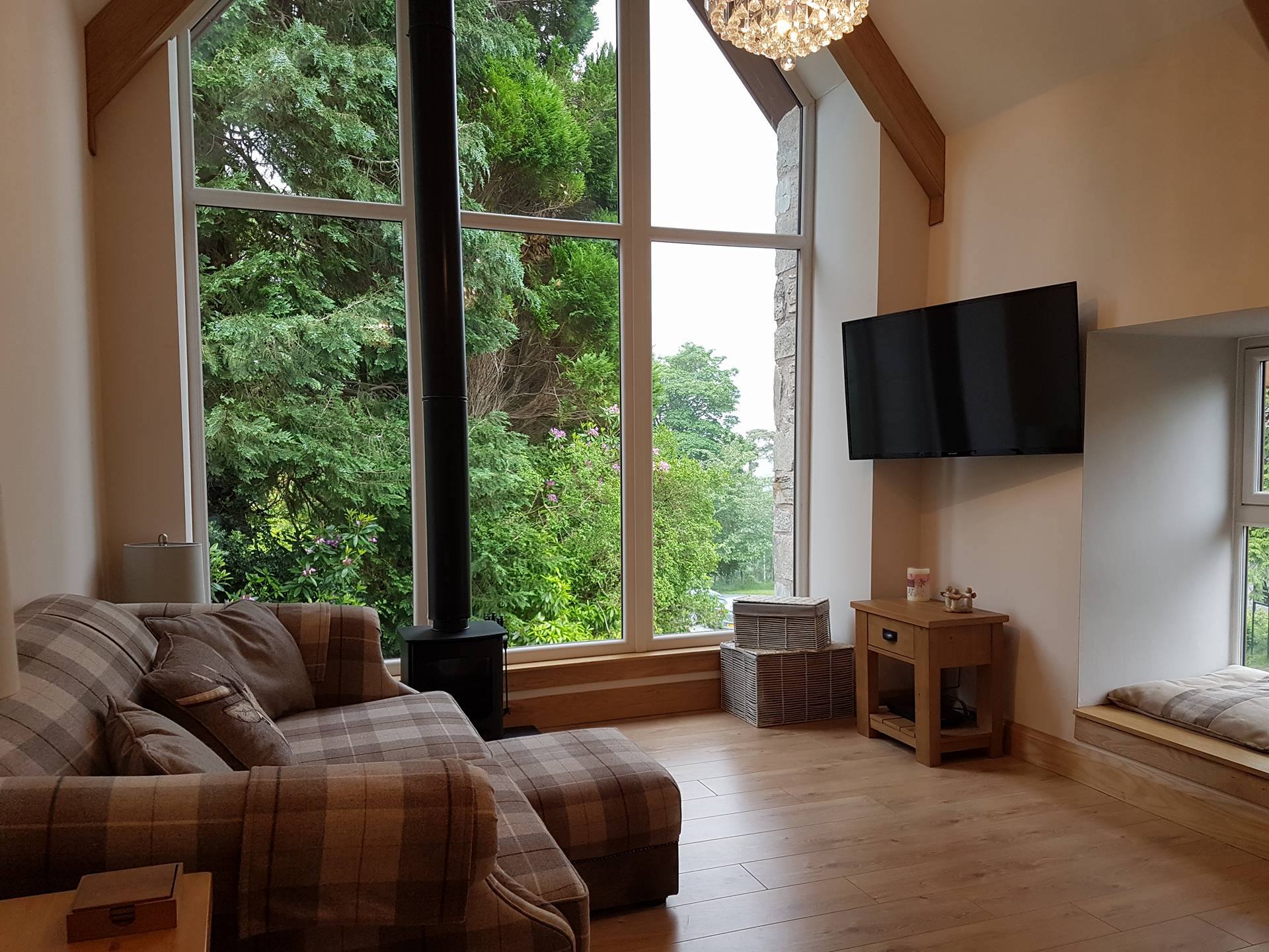 The Armoury Holiday Home Glenfinnan Tv Area Log Fire Window View