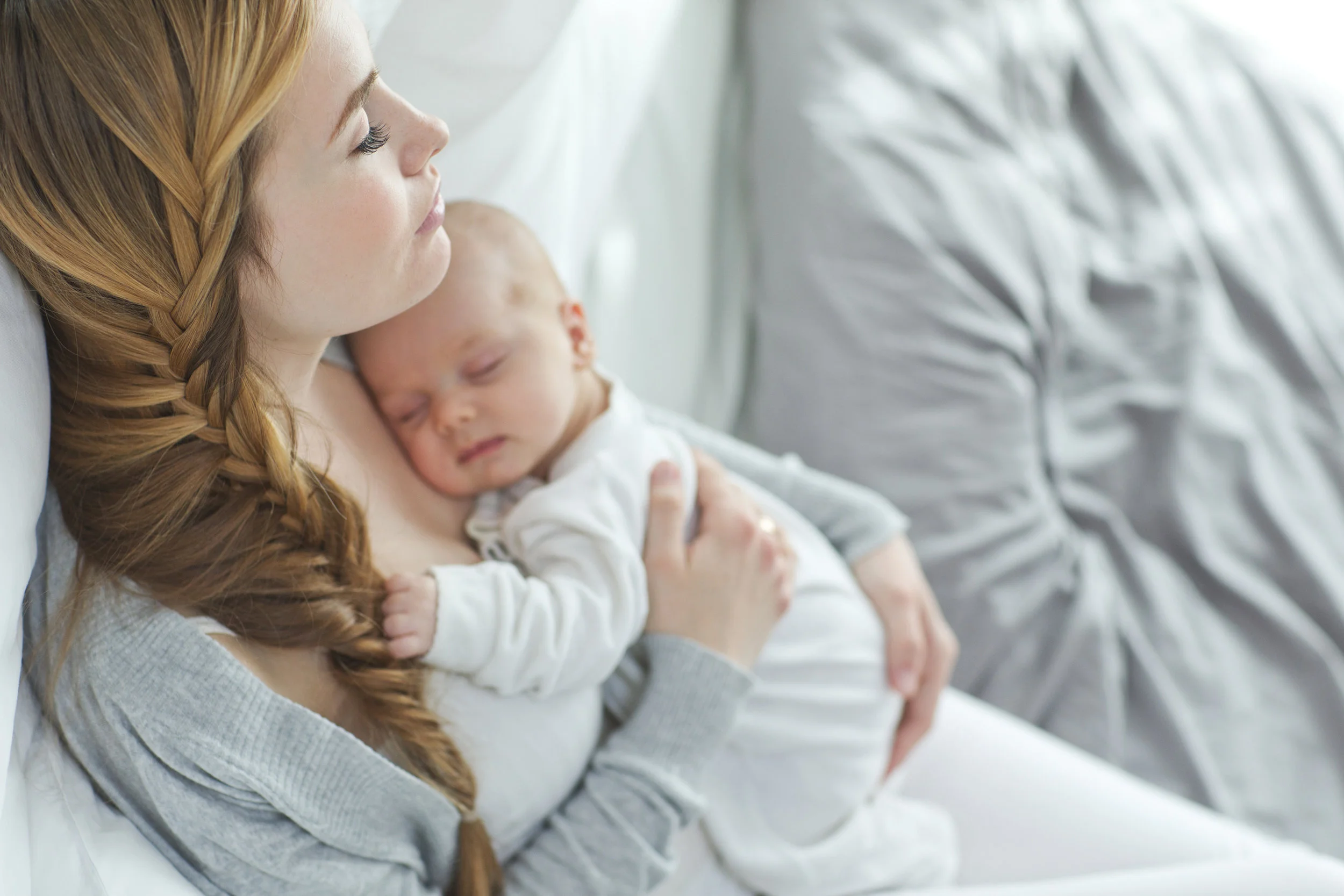 Mom resting with baby.jpeg