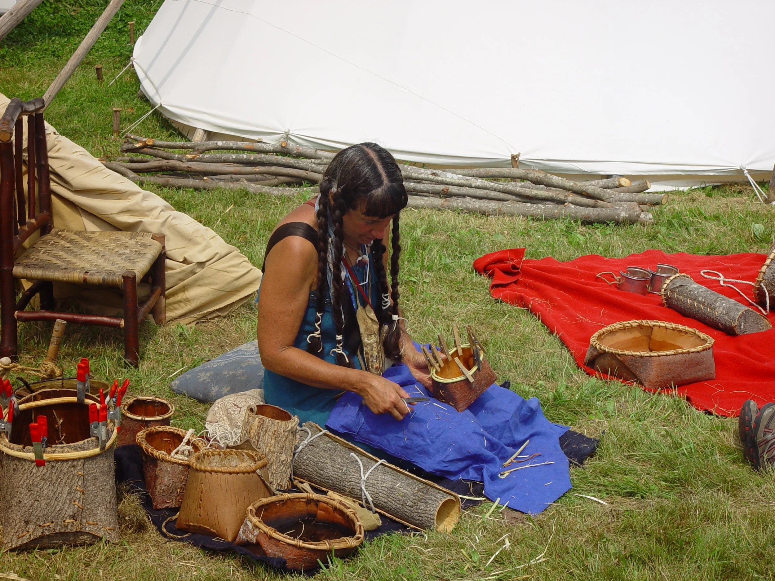 Basket weaving demonstration by Jennifer Lee featuring traditional Native craftwork