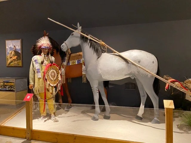 Plains cultures exhibit featuring a horse and rider display at Mt. Kearsarge Indian Museum