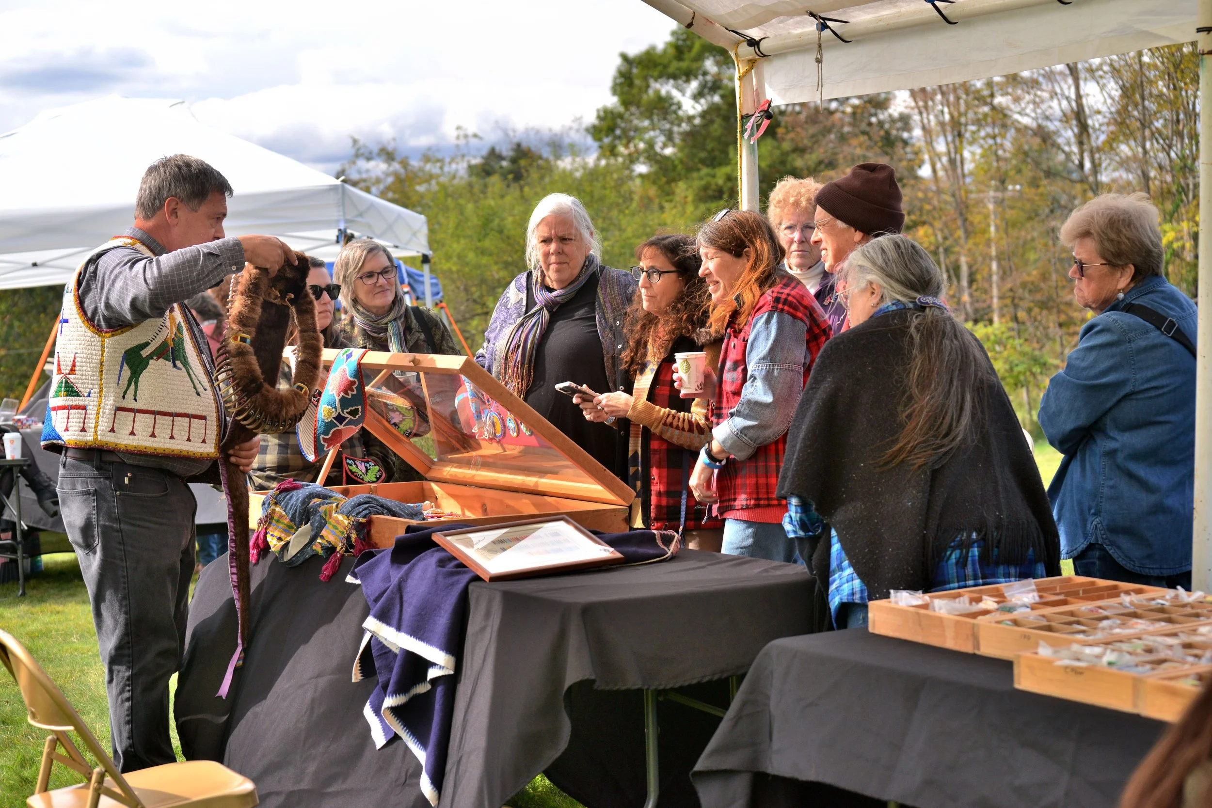 Families and visitors enjoying a cultural craft activity at Mt. Kearsarge Indian Museum, NH