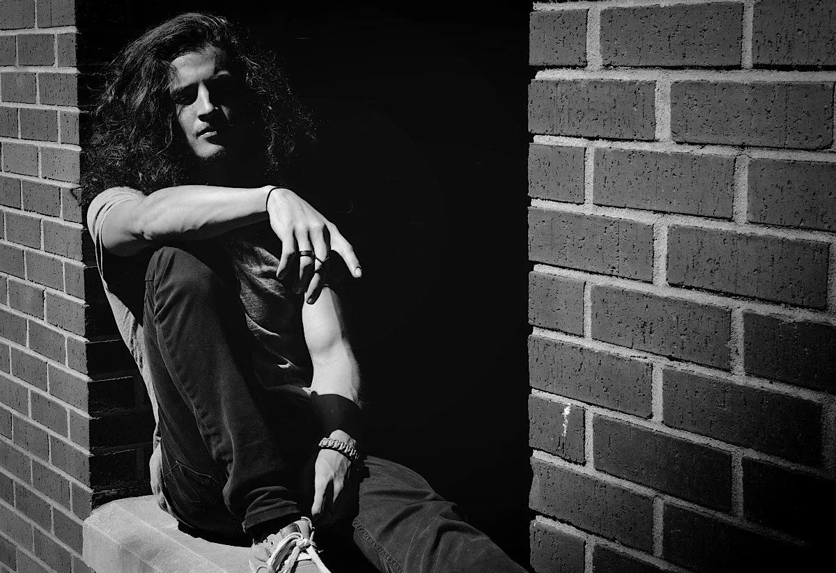 This is a high contrast portrait outside the parking garage. Alex looks great! (Click on photo to enlarge)