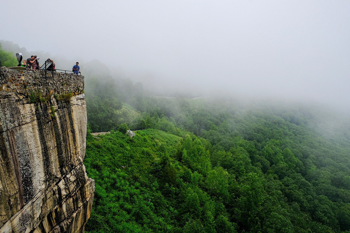 I really like the color and texture of the rock face and the angle of the clouds across this scene.
