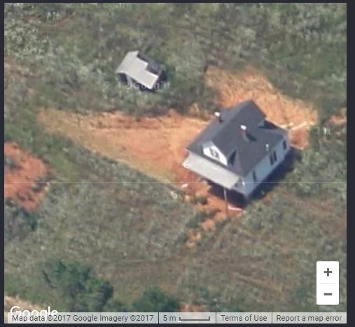 Zooming all of the way in on Google Maps block (below left) reveals the house as it was in better times.