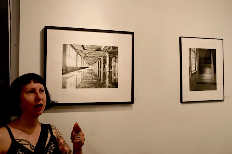 Dale again, making a point in front of her photograph, Bud Plant (1) . You can see more of her work here.