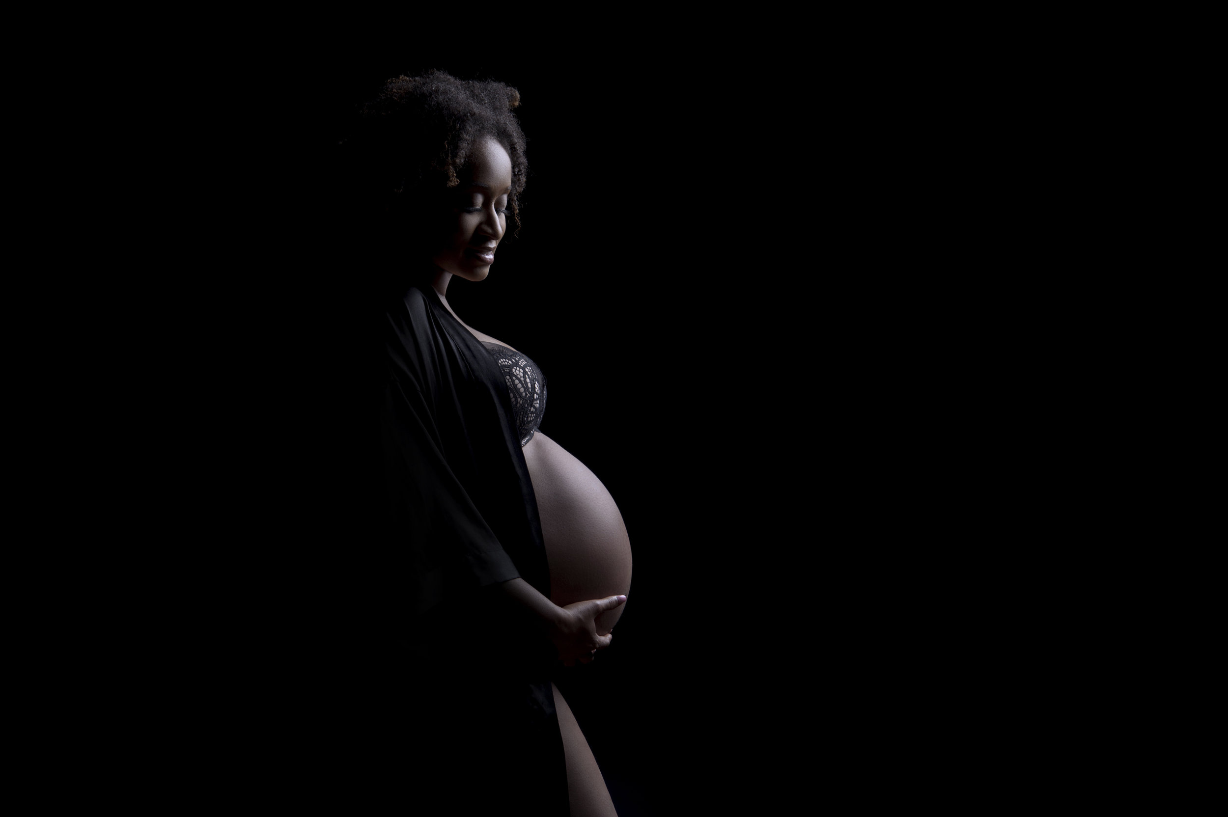 Gorgeous maternity tummy pose by Sri and Jana Photography