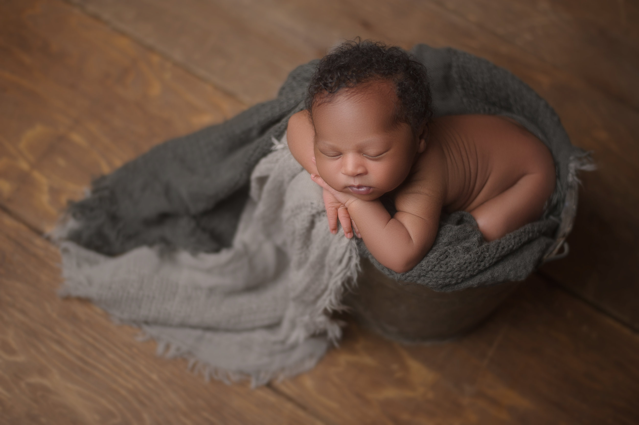 Newborn baby captured in a peaceful moment of slumber