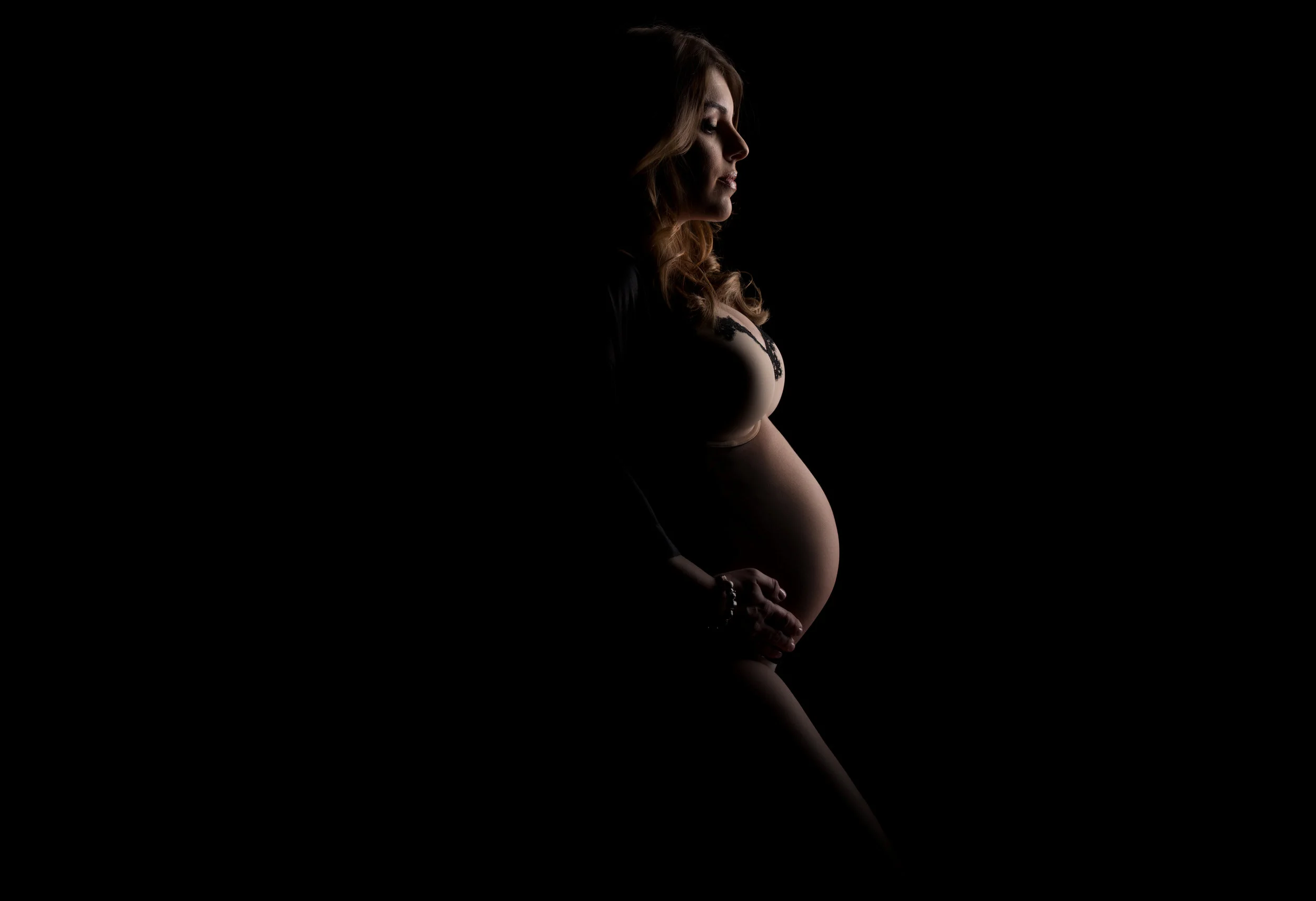 Gorgeous maternity tummy pose by Sri and Jana Photography