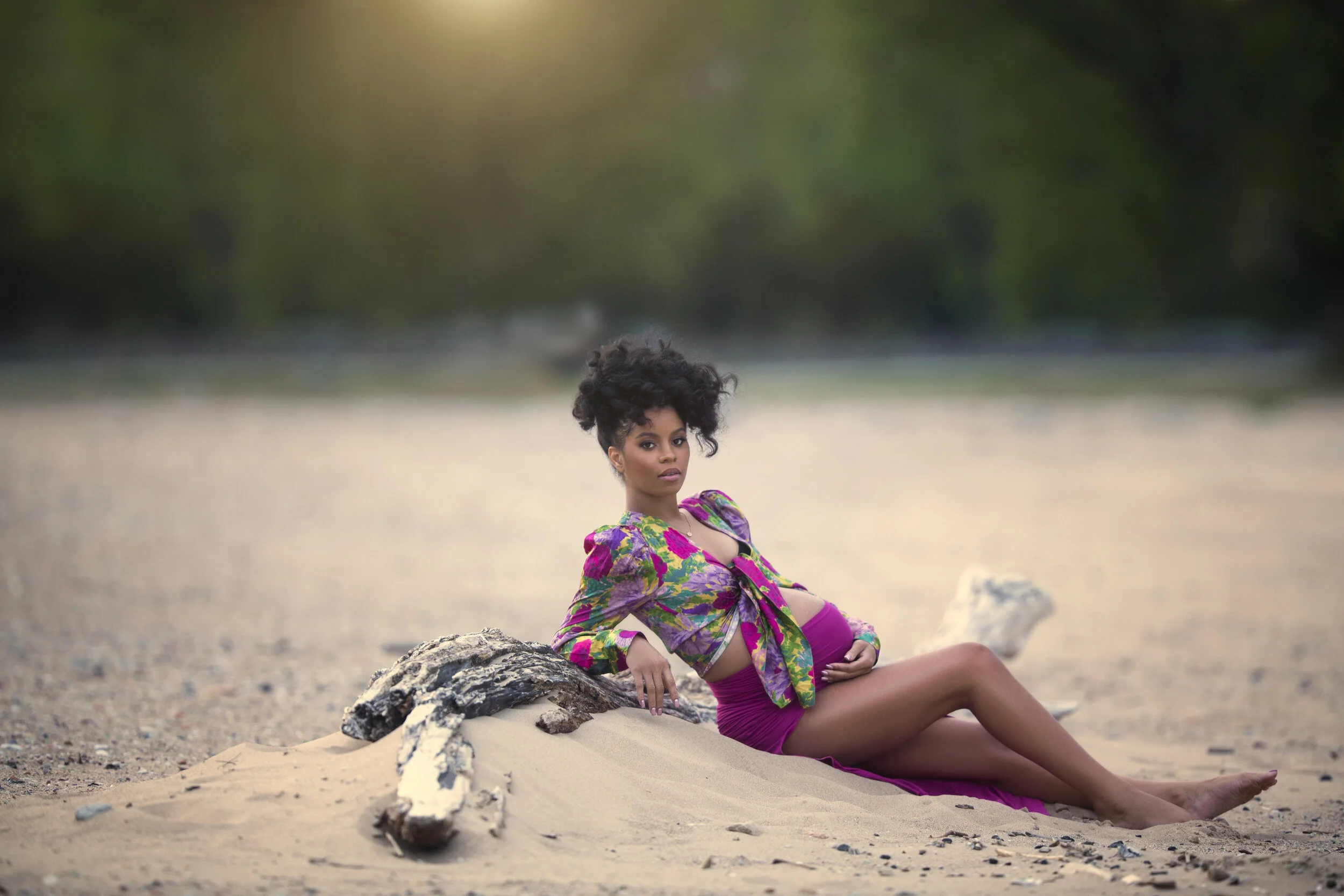 Maternity photoshoot on sandy beach by the sea