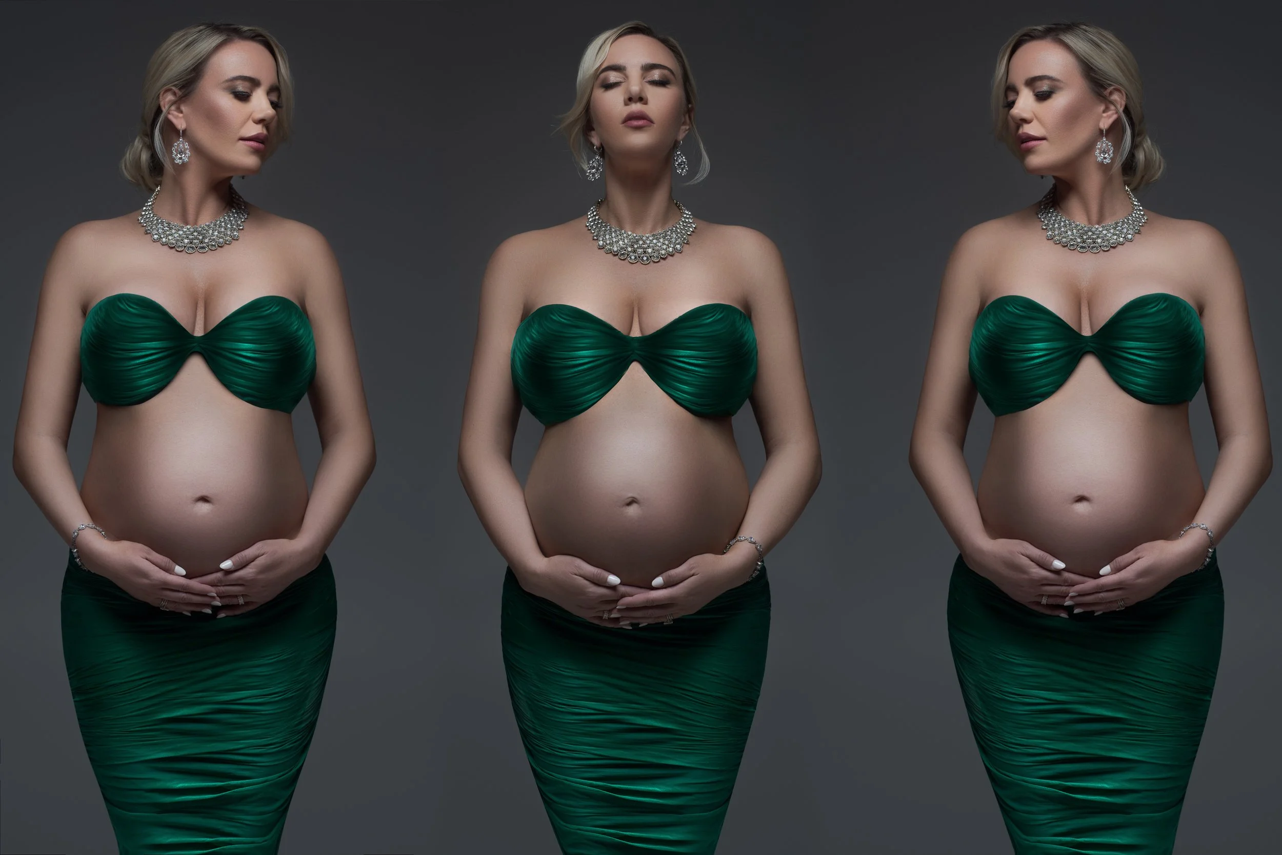 Artistic maternity photo. Elegant pregnant woman in green ruched strapless dress and jewelry.