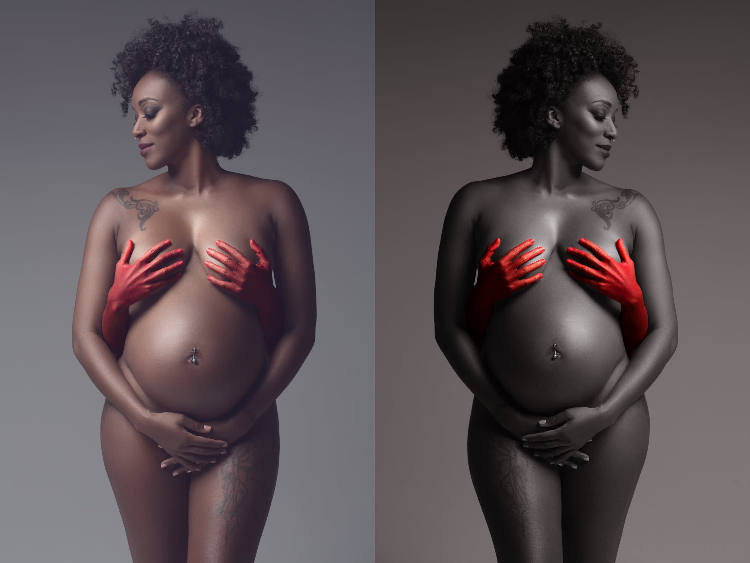 A woman with dark curly hair is posed topless, covering her breasts with her hands, which are painted red. 