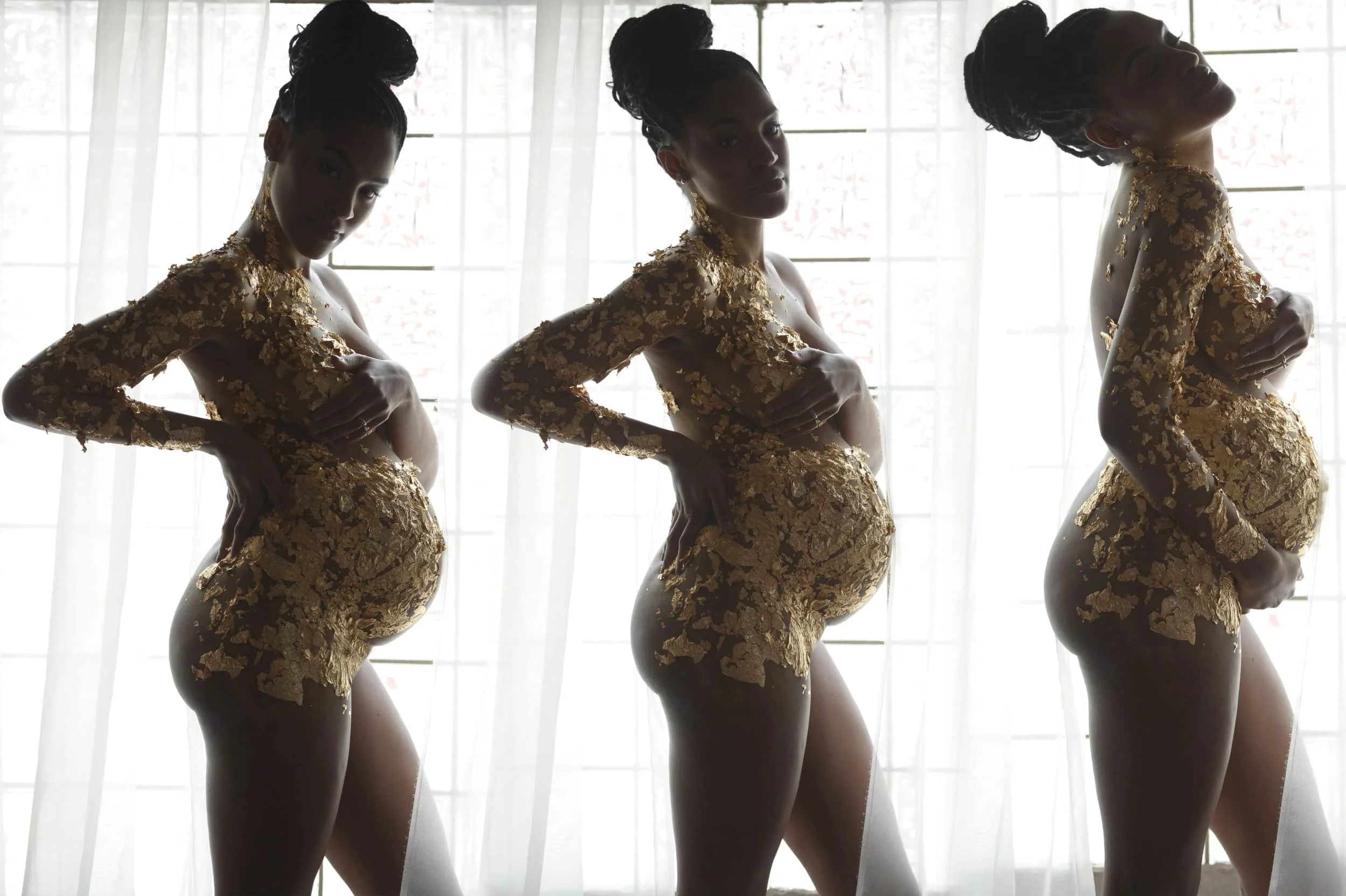 Four women standing side by side in front of a backlit window, each wearing a gold, floral-patterned dress with long sleeves and matching jewelry, striking different poses.